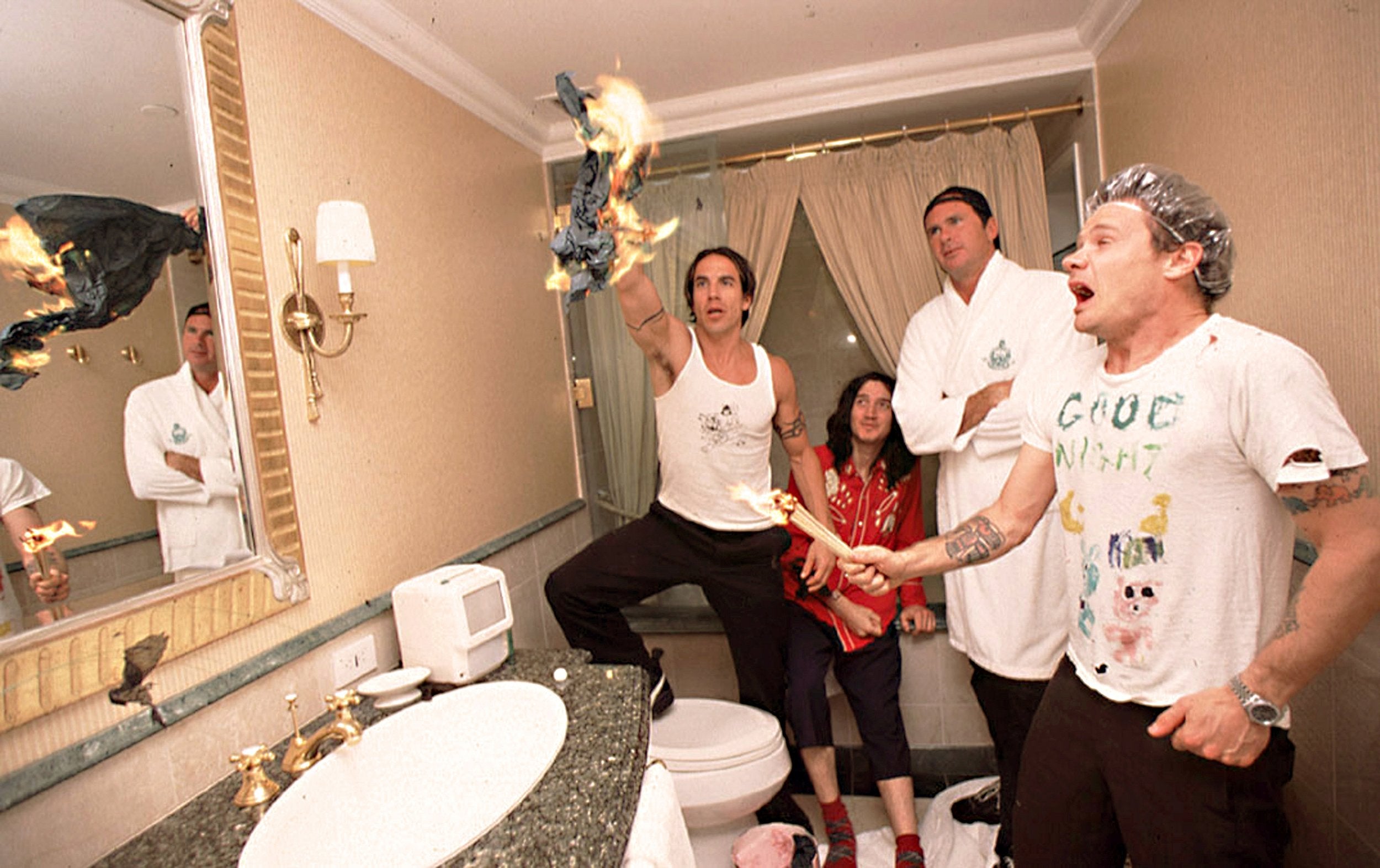 Red Hot Chili Peppers at the Bevery Hills Hotel Lighting up fire in bathroom 1 of 5